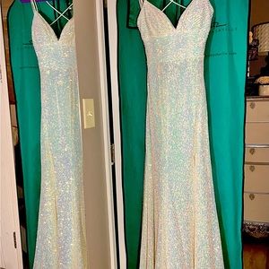 Beautiful iridescent long slit Sherri Hill Worn once. Size 4…can fit a 6…$375